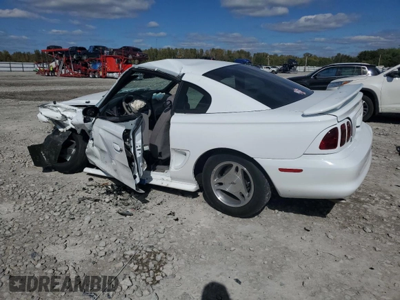 1998 Ford Mustang with VIN 1FAFP4045WF260082, listed as a Copart auction lot 72363433 with 38,643 mi miles and Salvage title. Bid and sale history available at DreamBid. Image 2.
