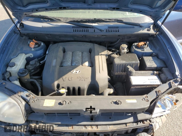 2006 Hyundai Santa Fe GLS with VIN KM8SC73D86U090048, listed as a Copart auction lot 77769074 with 112,122 mi miles and Salvage Title. Bid and sale history available at carsss.com. Image 14.