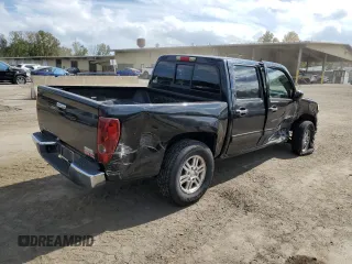 2011 GMC Canyon SLE1 with VIN 1GTH6MFE8B8102114, listed as a Copart auction lot 74137234 with 150,598 mi miles and Salvage Title. Bid and sale history available at carsss.com. Image 3.
