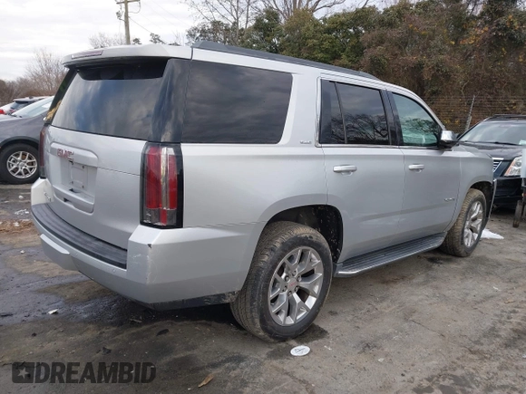 2016 GMC Yukon SLE with VIN 1GKS2AKC0GR332224, listed as a IAAI auction lot 41301706 with 108,340 mi miles. Bid and sale history available at carsss.com. Image 4.