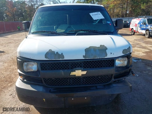 2011 Chevrolet Express Cargo Van with VIN 1GCWGFFAXB1128865, listed as a IAAI auction lot 41104936 with 236,517 mi miles. Bid and sale history available at carsss.com. Image 6.