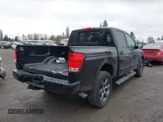 2012 Nissan Titan SV with VIN 1N6BA0EJ0CN303050, listed as a IAAI auction lot 41892370 with 120,018 mi miles. Bid and sale history available at carsss.com. Image 4.