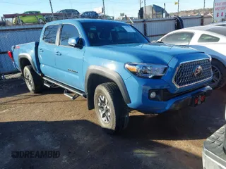 2019 Toyota Tacoma SR z VIN 3TMCZ5AN8KM192469, wystawiony jako IAAI lot #41461392 z przebiegiem 69 385 mil mil oraz . Historia ofert i sprzedaży dostępna na DreamBid. Obrazek 1.