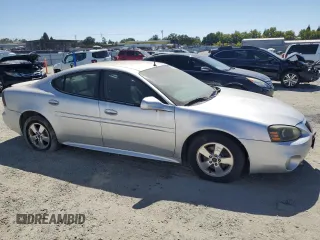 2005 Pontiac Grand Prix with VIN 2G2WP522551286641, listed as a Copart auction lot 63907535 with 148,938 mi miles and Clean title. Bid and sale history available at DreamBid. Image 4.