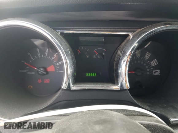 2007 Ford Mustang Deluxe z VIN 1ZVFT80NX75255793, wystawiony jako Copart lot #58993805 z przebiegiem 159 882 mil mil oraz Szkoda całkowita • Salvage title. Historia ofert i sprzedaży dostępna na DreamBid. Obrazek 9.