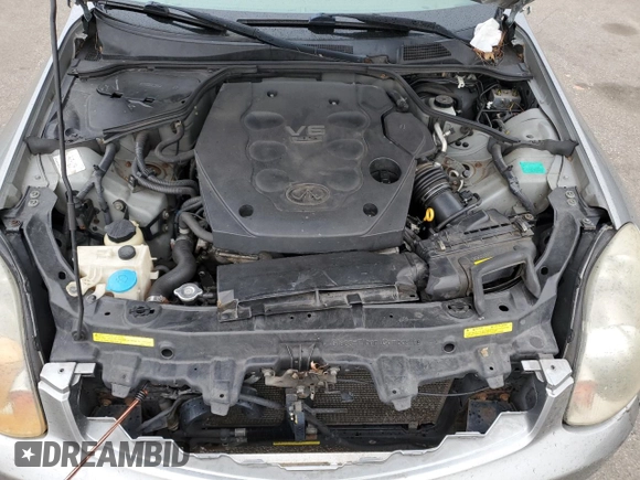 2004 Infiniti G35 w/Leather z VIN JNKCV51F04M715114, wystawiony jako Copart lot #45109415 z przebiegiem 244 446 mil mil oraz Szkoda całkowita • Salvage title. Historia ofert i sprzedaży dostępna na DreamBid. Obrazek 11.