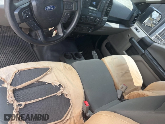 2019 Ford F-150 XL with VIN 1FTMF1EB1KKE10510, listed as a IAAI auction lot 42726982 with 98,336 mi miles and . Bid and sale history available at DreamBid. Image 20.