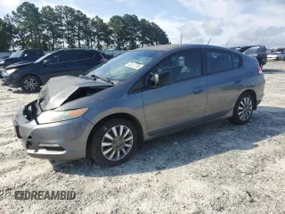 2011 Honda Insight with VIN JHMZE2H31BS003174, listed as a Copart auction lot 60212735 with 258,463 mi miles and Salvage title. Bid and sale history available at DreamBid. Image 1.
