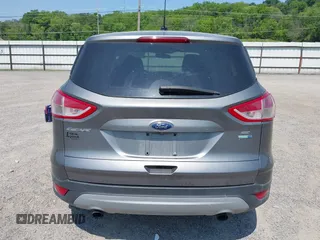 2014 Ford Escape SE with VIN 1FMCU9GXXEUE08655, listed as a IAAI auction lot 42469634 with 163,054 mi miles and . Bid and sale history available at DreamBid. Image 16.
