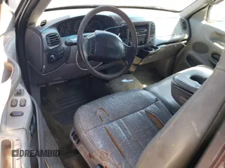 1997 Ford F-150 XL z VIN 1FTEX17L8VNB84878, wystawiony jako Copart lot #52695045 z przebiegiem 446 498 mil mil oraz Szkoda całkowita • Salvage title. Historia ofert i sprzedaży dostępna na DreamBid. Obrazek 8.