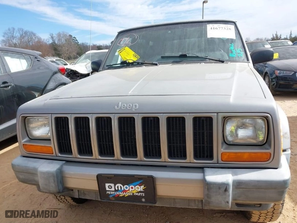 2000 Jeep Cherokee Police with VIN 1J4FT48S6YL142159, listed as a IAAI auction lot 41677328 with 107,154 mi miles. Bid and sale history available at carsss.com. Image 12.
