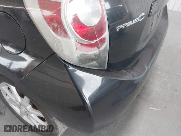 2013 Toyota Prius One z VIN JTDKDTB33D1046251, wystawiony jako IAAI lot #42304087 z przebiegiem 229 655 mil mil oraz . Historia ofert i sprzedaży dostępna na DreamBid. Obrazek 20.