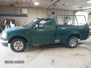 2000 Ford F-150 XL with VIN 2FTZF1722YCA27112, listed as a IAAI auction lot 42687404 with Not provided miles and . Bid and sale history available at DreamBid. Image 12.