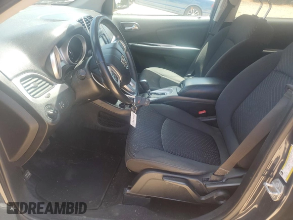2018 Dodge Journey SXT with VIN 3C4PDCBB6JT310810, listed as a Copart auction lot 58407545 with 69,631 mi miles and Salvage title. Bid and sale history available at DreamBid. Image 7.
