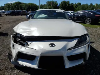 2021 Toyota GR Supra 3.0 with VIN WZ1DB0C0XMW037925, listed as a Copart auction lot 67085904 with 24,458 mi miles and Salvage Title. Bid and sale history available at carsss.com. Image 5.
