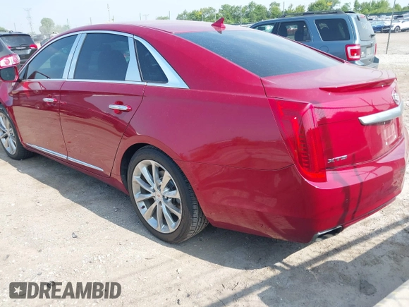 2013 Cadillac XTS Luxury z VIN 2G61P5S34D9139924, wystawiony jako IAAI lot #42504191 z przebiegiem 140 744 mil mil oraz . Historia ofert i sprzedaży dostępna na DreamBid. Obrazek 3.