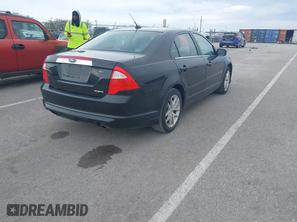 2011 Ford Fusion SEL with VIN 3FAHP0JG6BR331958, listed as a IAAI auction lot 41978266 with 158,982 mi miles. Bid and sale history available at carsss.com. Image 3.