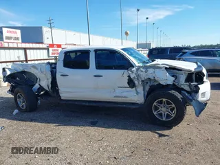 2013 Toyota Tacoma PreRunner with VIN 3TMKU4HN8DM038566, listed as a IAAI auction lot 41296386 with 153,240 mi miles and . Bid and sale history available at DreamBid. Image 14.