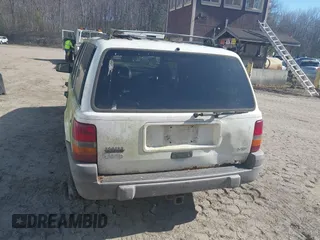 1996 Jeep Grand Cherokee Laredo with VIN 1J4GZ58Y7TC381600, listed as a IAAI auction lot 42065681 with 1 mi miles. Bid and sale history available at carsss.com. Image 6.