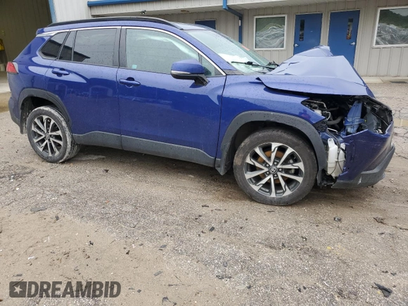 2022 Toyota Corolla Cross XLE with VIN 7MUDAABGXNV042443, listed as a Copart auction lot 57808565 with 102,887 mi miles and Salvage title. Bid and sale history available at DreamBid. Image 4.