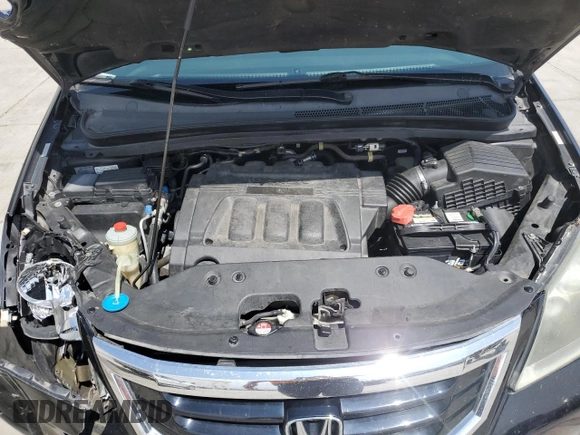 2008 Honda Odyssey Touring with VIN 5FNRL38908B092436, listed as a Copart auction lot 59914655 with 186,462 mi miles and Salvage title. Bid and sale history available at DreamBid. Image 12.