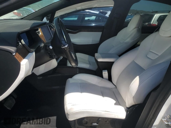 2016 Tesla Model X 70D with VIN 5YJXCAE28GF017100, listed as a Copart auction lot 50081235 with 126,962 mi miles and Salvage Title. Bid and sale history available at DreamBid. Image 7.