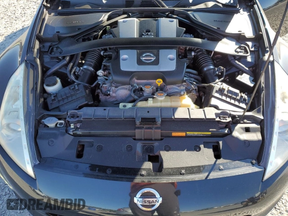 2014 Nissan 370Z Touring with VIN JN1AZ4FH3EM620195, listed as a Copart auction lot 83207104 with 66,974 mi miles and Salvage Title. Bid and sale history available at DreamBid. Image 13.