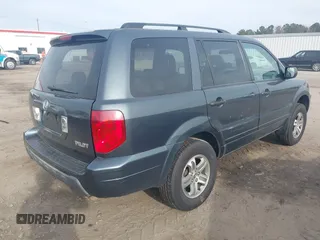2004 Honda Pilot EX with VIN 2HKYF184X4H590442, listed as a IAAI auction lot 40968680 with 224,892 mi miles. Bid and sale history available at carsss.com. Image 4.