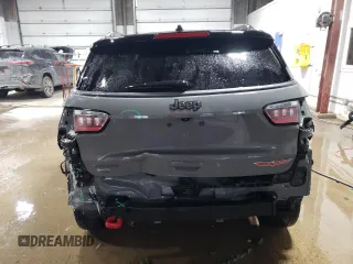 2020 Jeep Compass Trailhawk with VIN 3C4NJDDB0LT215553, listed as a Copart auction lot 45045165 with 90,702 mi miles and Salvage Title. Bid and sale history available at carsss.com. Image 6.