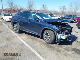 2022 Lexus RX with VIN 2T2HZMDA4NC358746, listed as a IAAI auction lot 41772090 with 26,370 mi miles. Bid and sale history available at carsss.com. Image 1.