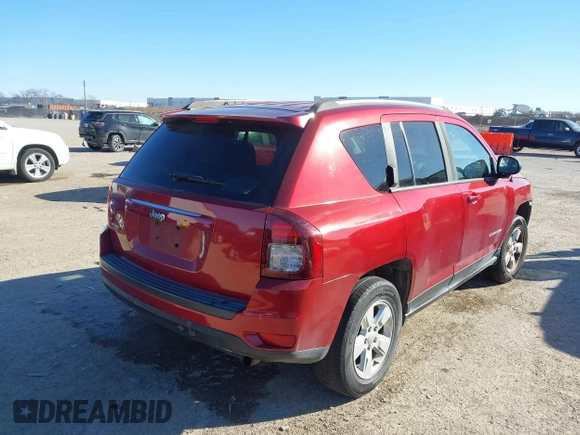 2014 Jeep Compass Sport with VIN 1C4NJCBA3ED812435, listed as a IAAI auction lot 41424374 with 174,663 mi miles and . Bid and sale history available at DreamBid. Image 4.