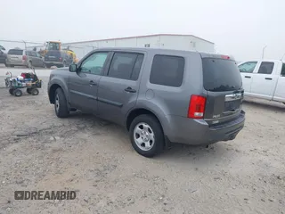2014 Honda Pilot LX with VIN 5FNYF4H2XEB004614, listed as a IAAI auction lot 42236980 with 160,357 mi miles and . Bid and sale history available at DreamBid. Image 3.