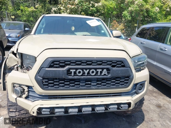 2017 Toyota Tacoma SR5 z VIN 3TMAZ5CN1HM026355, wystawiony jako IAAI lot #42060428 z przebiegiem 165 096 mil mil oraz . Historia ofert i sprzedaży dostępna na DreamBid. Obrazek 12.
