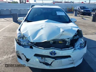 2014 Toyota Prius One with VIN JTDKDTB38E1575308, listed as a IAAI auction lot 40787857 with 70,891 mi miles and . Bid and sale history available at DreamBid. Image 12.