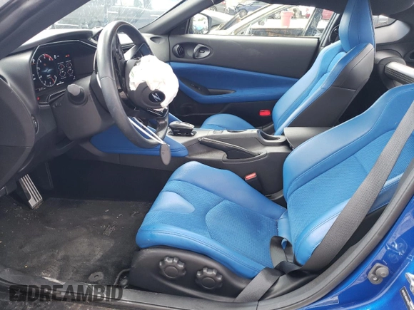 2023 Nissan Z Performance с VIN JN1BZ4BH4PM311459, выставлен на аукционе Copart как лот 52156984 с пробегом 12 312 миль миль и Списание • Salvage title. История ставок и продаж доступна на DreamBid. Изображение 7.