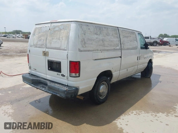 2012 Ford Econoline Cargo Recreational with VIN 1FTNE2EW2CDA43588, listed as a IAAI auction lot 41939220 with 246,855 mi miles. Bid and sale history available at carsss.com. Image 4.