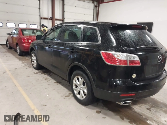 2011 Mazda CX-9 Sport with VIN JM3TB3BV9B0313270, listed as a IAAI auction lot 41474571 with 149,302 mi miles and . Bid and sale history available at DreamBid. Image 3.