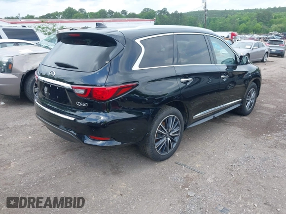 2020 Infiniti QX60 LUXE with VIN 5N1DL0MM8LC516594, listed as a IAAI auction lot 42136299 with 92,747 mi miles. Bid and sale history available at carsss.com. Image 4.