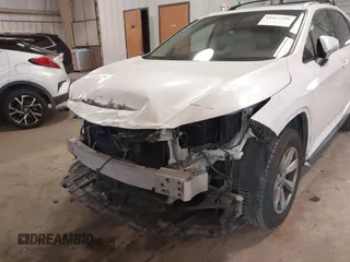 2018 Lexus RX 350 z VIN 2T2BZMCA5JC144530, wystawiony jako IAAI lot #41417396 z przebiegiem 97 860 mil mil oraz . Historia ofert i sprzedaży dostępna na DreamBid. Obrazek 20.