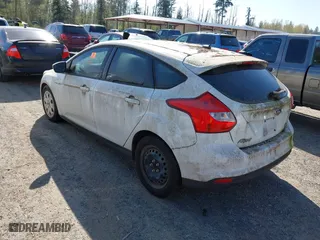 2012 Ford Focus SE with VIN 1FAHP3K23CL251716, listed as a IAAI auction lot 42036099 with 119,600 mi miles. Bid and sale history available at carsss.com. Image 3.