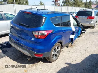 2017 Ford Escape SE z VIN 1FMCU0G95HUB75348, wystawiony jako IAAI lot #41790288 z przebiegiem 55 129 mil mil oraz . Historia ofert i sprzedaży dostępna na DreamBid. Obrazek 4.