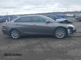 2015 Toyota Camry XLE with VIN 4T1BF1FKXFU936775, listed as a IAAI auction lot 41807486 with 97,148 mi miles and . Bid and sale history available at DreamBid. Image 14.