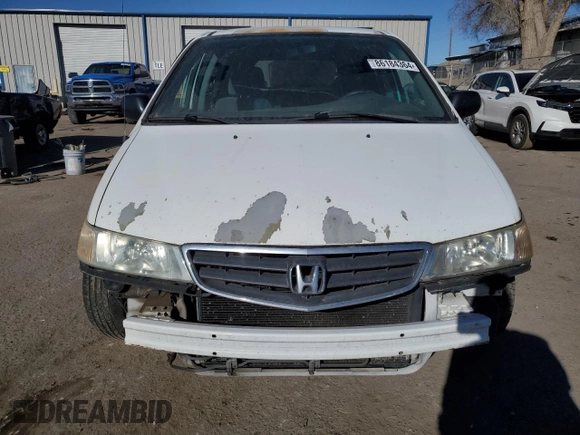 2003 Honda Odyssey LX z VIN 5FNRL18573B116337, wystawiony jako Copart lot #86184364 z przebiegiem 247 492 mil mil oraz Szkoda całkowita • Salvage title. Historia ofert i sprzedaży dostępna na DreamBid. Obrazek 5.