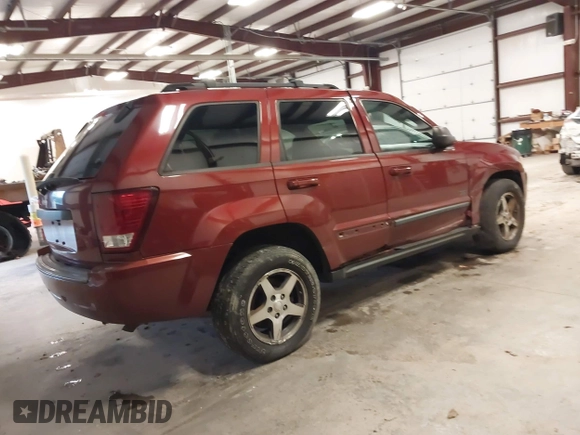 2007 Jeep Grand Cherokee Laredo with VIN 1J8GR48K97C631672, listed as a IAAI auction lot 41520054 with 231,576 mi miles. Bid and sale history available at carsss.com. Image 4.