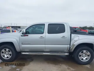 2009 Toyota Tacoma PreRunner with VIN 3TMJU62NX9M081748, listed as a IAAI auction lot 41608525 with 210,999 mi miles. Bid and sale history available at carsss.com. Image 14.