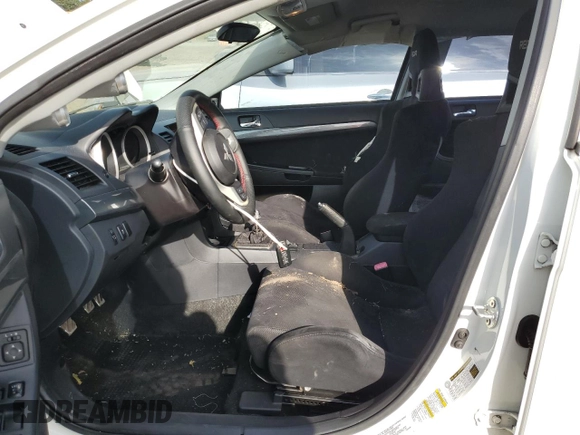 2011 Mitsubishi Lancer Evolution GSR with VIN JA32W8FV4BU033621, listed as a Copart auction lot 71182174 with 129,131 mi miles and Salvage Title. Bid and sale history available at carsss.com. Image 7.