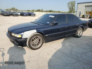 2001 BMW 7 Series 740iA with VIN WBAGG83421DN85338, listed as a Copart auction lot 71231314 with 185,234 mi miles and Salvage Title. Bid and sale history available at carsss.com. Image 1.