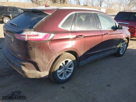 2020 Ford Edge SEL with VIN 2FMPK4J95LBA88331, listed as a IAAI auction lot 41013468 with 129,755 mi miles. Bid and sale history available at carsss.com. Image 4.