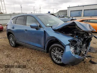 2017 Mazda CX-5 Touring z VIN JM3KFBCL2H0129000, wystawiony jako Copart lot #52107005 z przebiegiem 55 411 mil mil oraz Szkody całkowita. Historia ofert i sprzedaży dostępna na DreamBid. Obrazek 4.