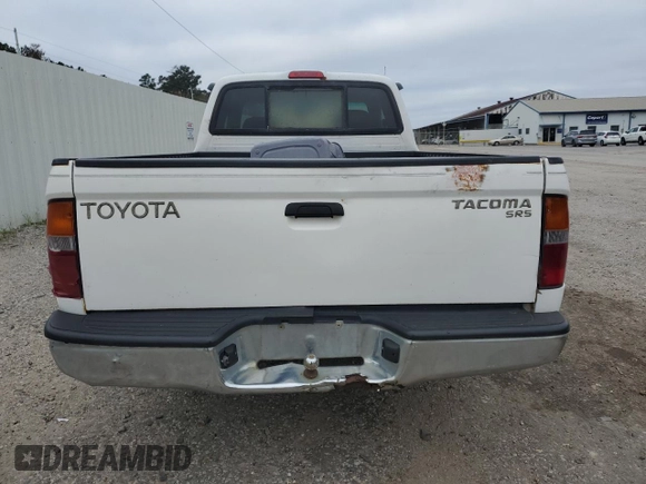 1999 Toyota Tacoma z VIN 4TAVL52N6XZ555376, wystawiony jako Copart lot #85763154 z przebiegiem 229 914 mil mil oraz Nie do naprawy • Non repairable. Historia ofert i sprzedaży dostępna na DreamBid. Obrazek 6.